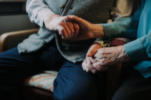 older couple holding hands, close-up, detail, 
