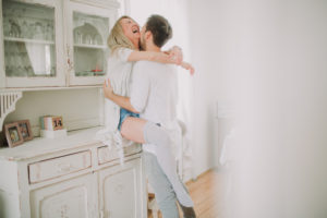 Young couple in love in the kitchen 