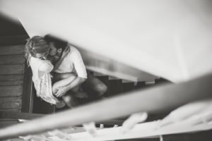 Young couple in love in the stairwell, b/w