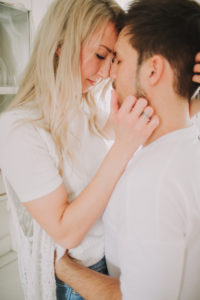Young couple in love, embrace, tenderness, profile