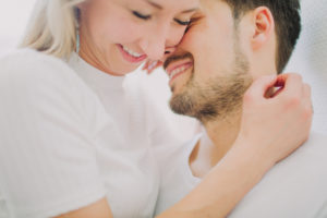Young couple in love, embrace, tenderness, profile