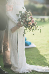 Alternate bridal couple outside, detail