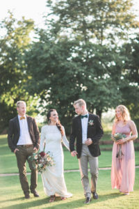 Alternate bridal couple and witness outside 