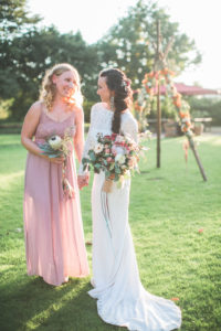 Bride and witness at alternative wedding outside