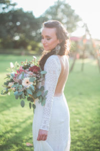 Young bride outside, half profile 