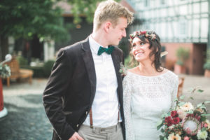 Alternate bridal couple outside, half portrait