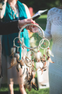 Alternate bridal couple at wedding ceremony outdoors, ceremony, dream catcher, detail 