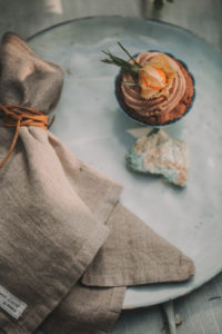 Festive laid table at alternative wedding celebration outside, detail