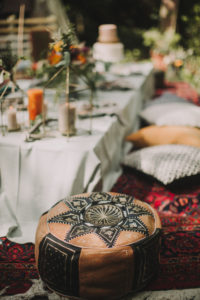Festive laid table at alternative wedding celebration outside, detail