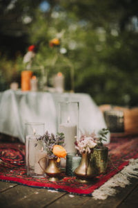 Festive laid table at alternative wedding celebration outside, detail