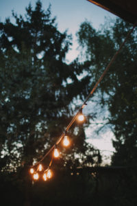 Alternative wedding, garden, decoration, string of lights, evening