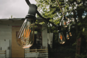 Alternative wedding, garden, decoration, string of lights, evening