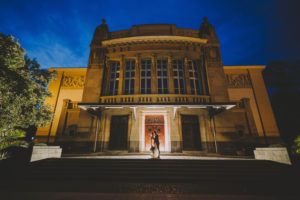Bridal couple, hug, building, entrance, lights, evening,
