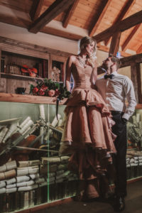 Bridal couple, music room, standing, sitting, eye contact,