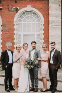 Wedding photo, newlyweds, bridal parents, groomsmen,