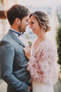 Bridal couple in love, smiling, half portrait,