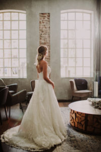 Bride looks thoughtfully out of the window Bride looks thoughtfully out of the window