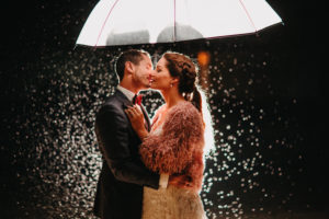 Newlyweds outside with jacket Newlyweds outside with jacket