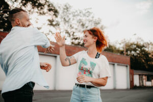 Young couple in love, fun, fooling around, outside