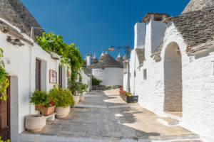 Alberobello, Bari province, Salento, Puglia, Italy, Europe. The typical trulli houses with their cone-shaped roof in the drywall style