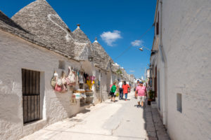 Alberobello, Bari province, Salento, Puglia, Italy, Europe. The typical trulli houses with their cone-shaped roof in the drywall style