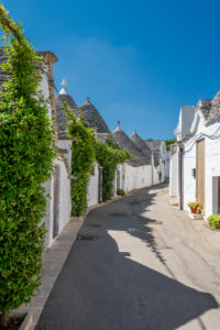 Alberobello, Bari province, Salento, Puglia, Italy, Europe. The typical trulli houses with their cone-shaped roof in the drywall style