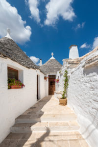 Alberobello, Bari province, Salento, Puglia, Italy, Europe. Entrance to a typical trullo with its conical roof