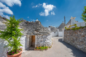 Alberobello, Bari province, Salento, Puglia, Italy, Europe. The typical trulli houses with their cone-shaped roof in the drywall style