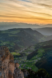 Gardena Pass, Bolzano Province, South Tyrol, Italy. View at sunset from the summit of the Großer Cirspitze down into the Val Gardena valley Gardena Pass, Bolzano Province, South Tyrol, Italy. View at sunset from the summit of the Großer Cirspitze down into the Val Gardena valley