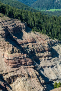 Aldein, Province of Bolzano, South Tyrol, Italy. Geoparc Bletterbach. Layers of rock in the Bletterbach Gorge Aldein, Province of Bolzano, South Tyrol, Italy. Geoparc Bletterbach. Layers of rock in the Bletterbach Gorge