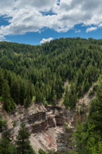 Aldein, Province of Bolzano, South Tyrol, Italy. Geoparc Bletterbach. The so-called "Butter Hole" in the Bletterbach Gorge Aldein, Province of Bolzano, South Tyrol, Italy. Geoparc Bletterbach. The so-called "Butter Hole" in the Bletterbach Gorge