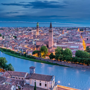 Verona, Province of Verona, Veneto, Italy. Evening view from Castel San Pietro down to the Adige river and the city of Verona Verona, Province of Verona, Veneto, Italy. Evening view from Castel San Pietro down to the Adige river and the city of Verona