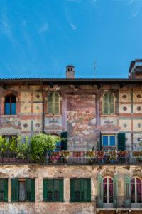Verona, Province of Verona, Veneto, Italy. The wonderful frescoes by Alberto Cavalli on the Mazzanti houses Verona, Province of Verona, Veneto, Italy. The wonderful frescoes by Alberto Cavalli on the Mazzanti houses