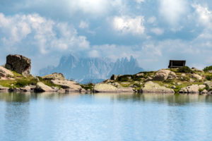 Villanders, Bolzano Province, South Tyrol, Italy. The Totensee and in the background the Geisler peaks Villanders, Bolzano Province, South Tyrol, Italy. The Totensee and in the background the Geisler peaks