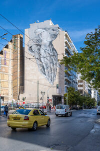 Athens, Greece. Street art in the streets of Athens, 'He is praying for us' by Pavlos Tsakonas