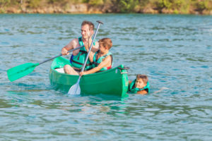 Family canoeing on Esparron de Verdon lake, Esparron de Verdon, Alpes de Haute Provence, Provence, France, Europe, Family canoeing on Esparron de Verdon lake, Esparron de Verdon, Alpes de Haute Provence, Provence, France, Europe,