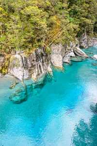 View of the blue pools on the Marokopa River, Haast Pass, Mount Aspiring National Park, Otago Region, South Island, New Zealand