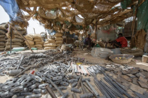 Gold prospectors at work in the Delgo gold market in the Sahara, Sudan