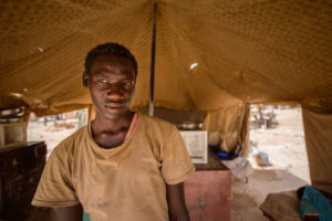 Gold prospectors at work in the Delgo gold market in the Sahara, Sudan