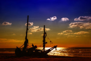 Netherlands, Holland, on the West Frisian island of Texel, North Holland, shipwreck on the beach, evening mood Netherlands, Holland, on the West Frisian island of Texel, North Holland, shipwreck on the beach, evening mood