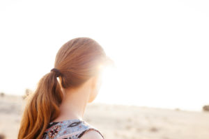 Woman enjoying the sunset view, Dubai desert 