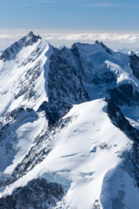 View from the small plane to the Bernina group in the swiss alps View from the small plane to the Bernina group in the swiss alps