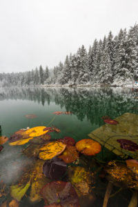 The first snow in November covers Lake Cresta near Trin with a winter dress, Canton Grisons, Switzerland The first snow in November covers Lake Cresta near Trin with a winter dress, Canton Grisons, Switzerland