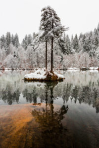 The first snow in November covers Lake Cresta near Trin with a winter dress, Canton Grisons, Switzerland The first snow in November covers Lake Cresta near Trin with a winter dress, Canton Grisons, Switzerland