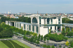 Germany, Berlin, Tiergarten district, the Reichstag or German Bundestag (German Parlement since 1999), a building conceived by Paul Wallot, inaugurated in 1894, with a glass dome added in 1999 by architect Sir Norman Foster, view from the top of the cupola of official buildings Germany, Berlin, Tiergarten district, the Reichstag or German Bundestag (German Parlement since 1999), a building conceived by Paul Wallot, inaugurated in 1894, with a glass dome added in 1999 by architect Sir Norman Foster, view from the top of the cupola of official buildings