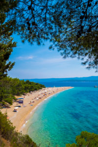 Brac, Croatia - June 3, 2017: Zlatni rat beach is the most famous in Croatia Brac, Croatia - June 3, 2017: Zlatni rat beach is the most famous in Croatia