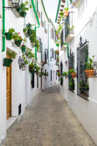 White architecture and traditional Andalusian decoration in the Villa neighborhood in the center of Priego de Cordoba in Andalucia in southern Spain White architecture and traditional Andalusian decoration in the Villa neighborhood in the center of Priego de Cordoba in Andalucia in southern Spain