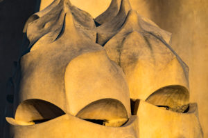 Roof of the Casa Mila (also known as La Pedrera) of the Catalan modernist architect Antoni Gaudi located on the famous Avinguda de Gracia street in the Eixample area in the city of Barcelona in Catalonia Spain Roof of the Casa Mila (also known as La Pedrera) of the Catalan modernist architect Antoni Gaudi located on the famous Avinguda de Gracia street in the Eixample area in the city of Barcelona in Catalonia Spain