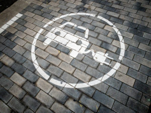 Road sign indicating that electric cars can be charged on Diagonal Avenue in the city of Barcelona in Catalonia and Spain Road sign indicating that electric cars can be charged on Diagonal Avenue in the city of Barcelona in Catalonia and Spain