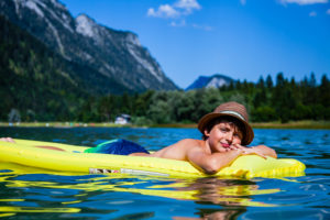 Boy, air mattress, lake, child, mountain Boy, air mattress, lake, child, mountain